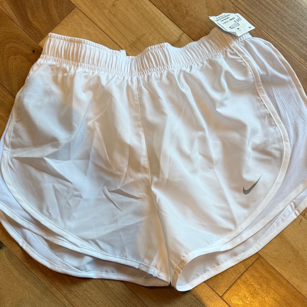 White Nike dry fit shorts. Women’s size small.